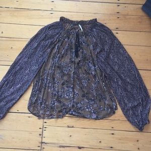 Buttoned down patterned blouse!